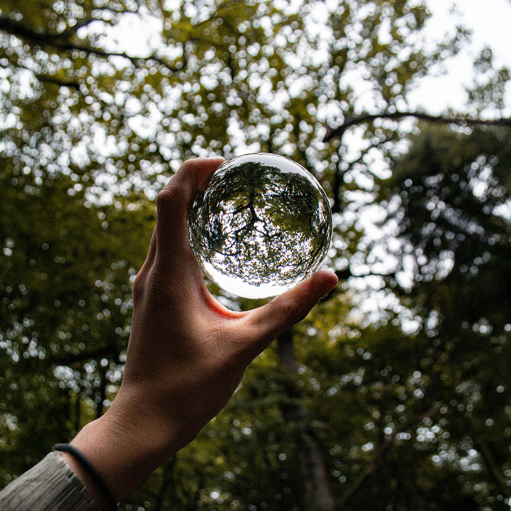 glass sphere in hand, look for clarity on humanist wedding